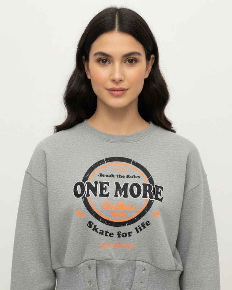 Cropped Graphic Sweatshirt with Studded Hem – ONE MORE